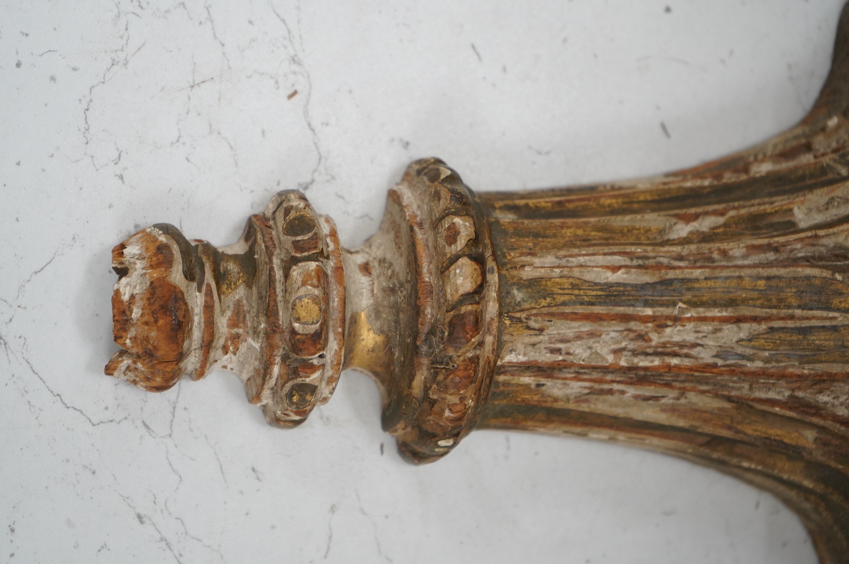 An 18th century parcel gilt carved wall bracket, 22cm high